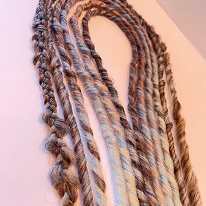 Synthetic (twisted) dreadlock extensions Brown, blonde, & blue.